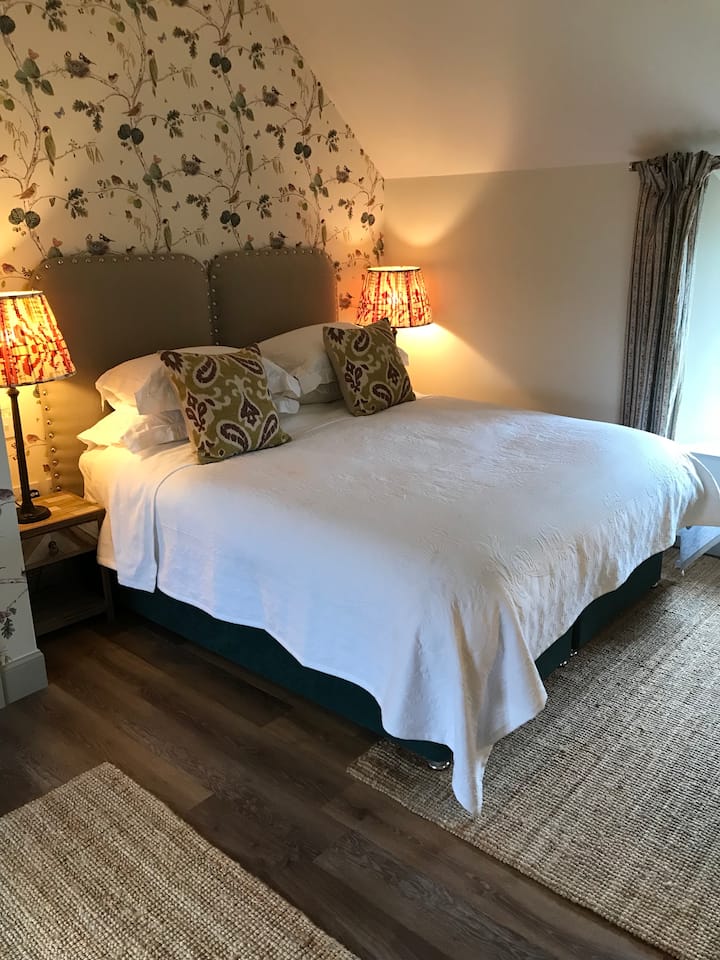 Bedroom 2 En-Suite with King Size bed. Goose down and feather mattress topper and duvet and crisp cotton bed linen. (Can be made into two singles if needed).