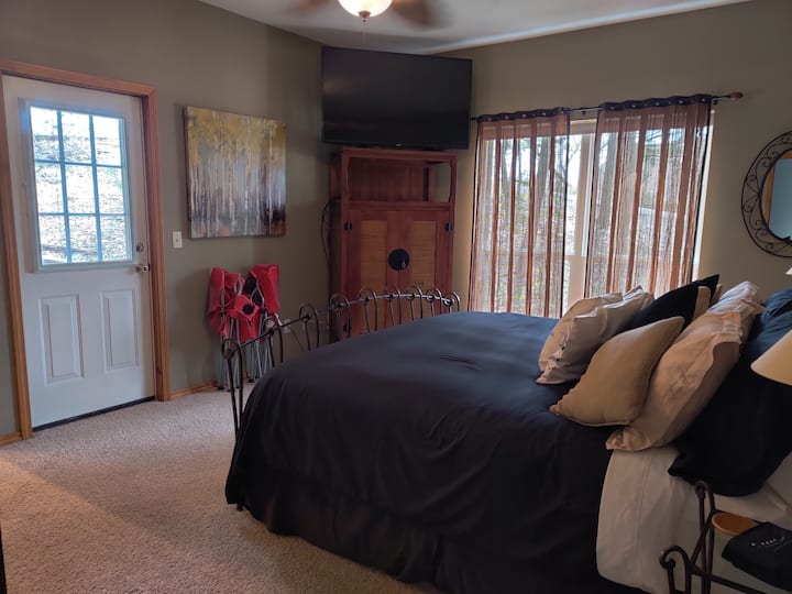 King Master Suite with cable, TV/DVD, and private deck (all bedrooms have ceiling fans)