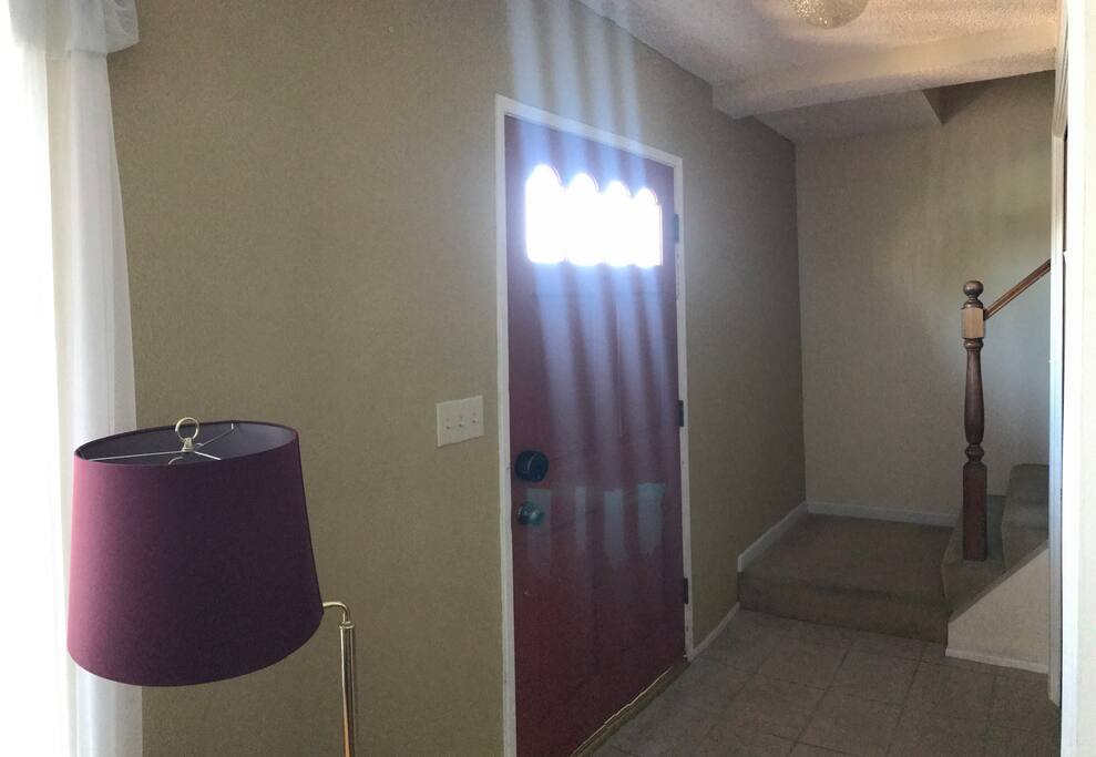Main entry to living room and stairs up