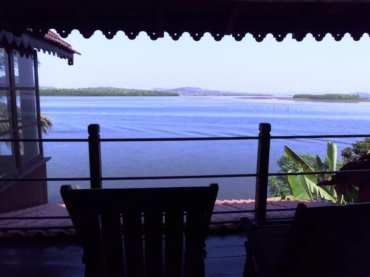 Wooden Chalet on the River Banks with private bathtub in Goa