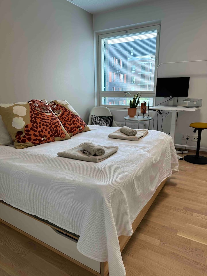 The master bedroom with a comfortable queen size bed.