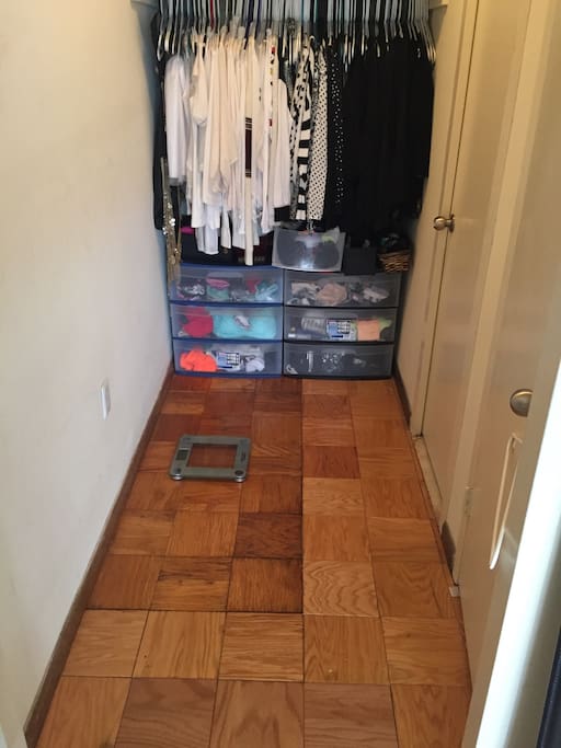 This is an open closet, in which would be empty and available for your stay