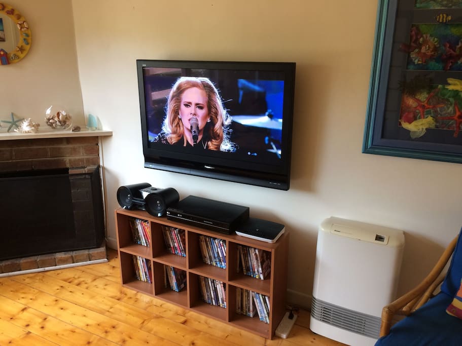 TV, DVD Player, Bluetooth Stereo, Wifi Modem, DVD collection, Open Fireplace and Gas Heater.