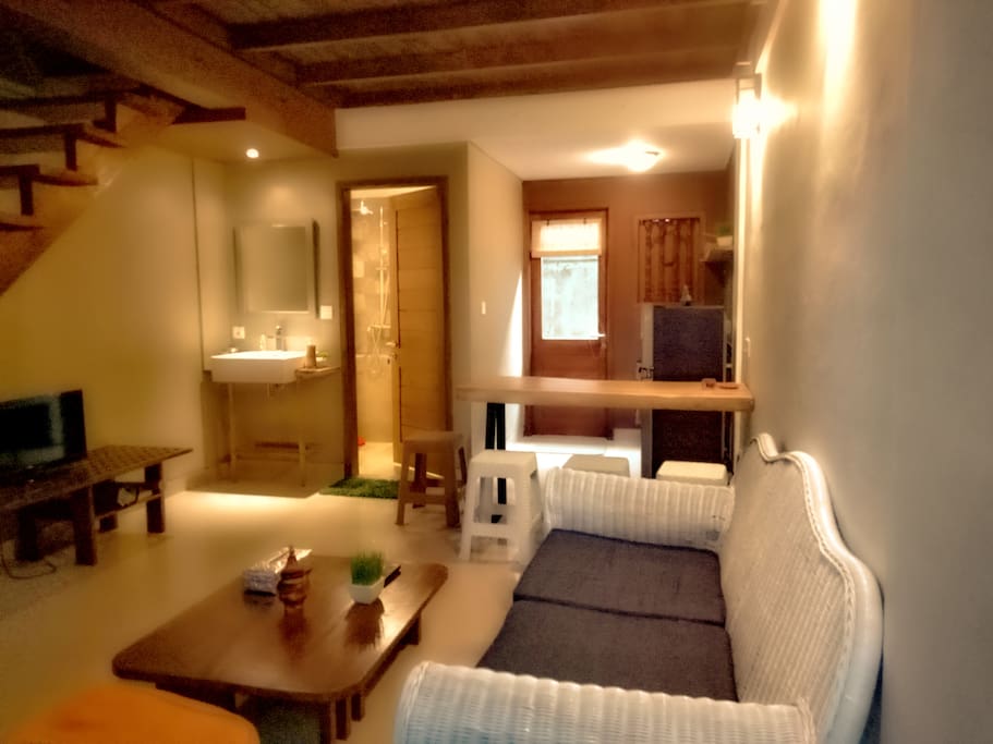 Watuluna Guest House Living Room with Dining Table