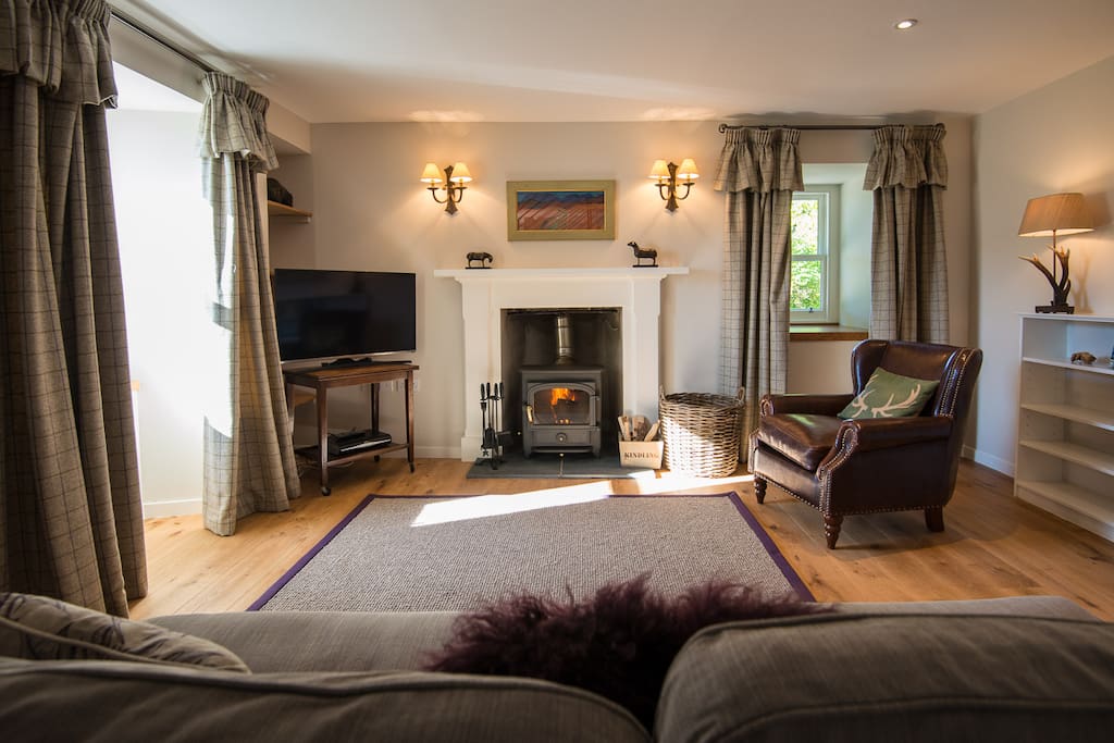 The cosy sitting area with woodburner
