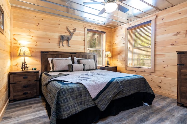 Bedroom 3: King bed, bright wooden accents and plush bedding create the perfect mountain escape!