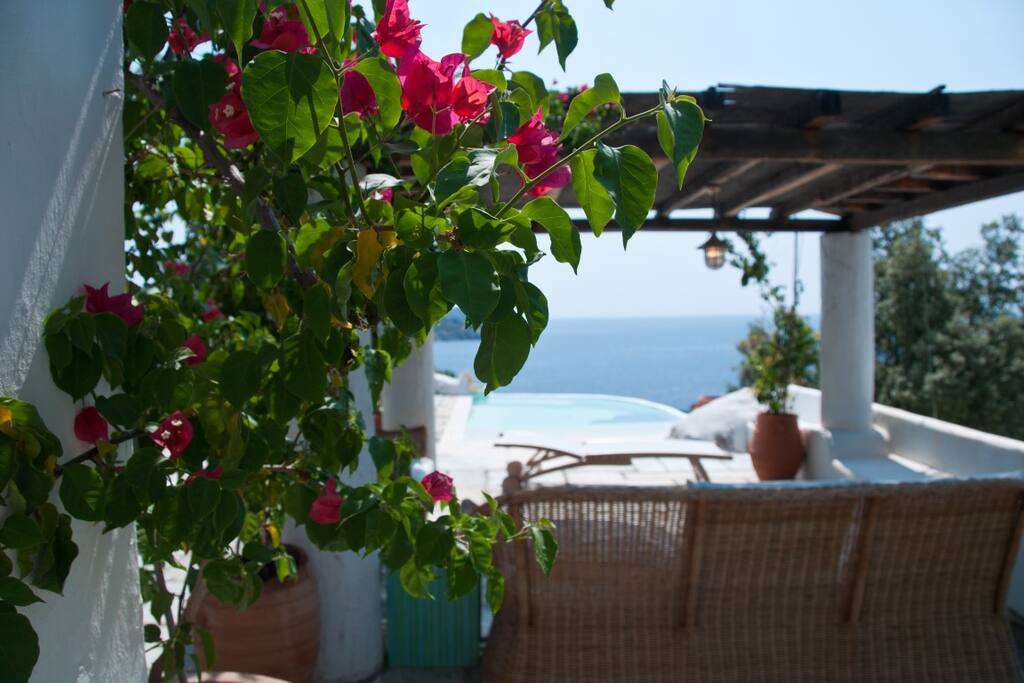 Sitting area from which play room can be overseen and faces the jacuzzi with swimming jets.