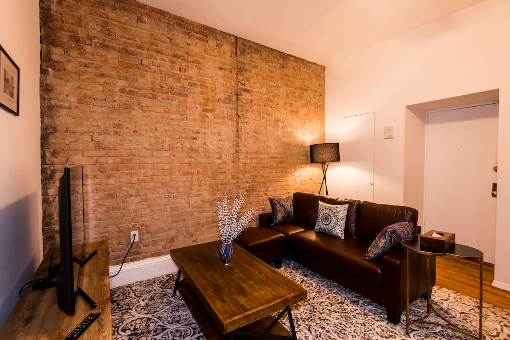 Brick walls create an authentic NYC feel