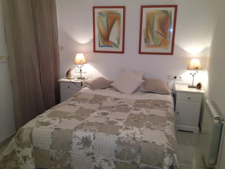 slaapkamer met tweepersoonsbed