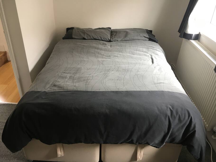 Bed in bedroom 1