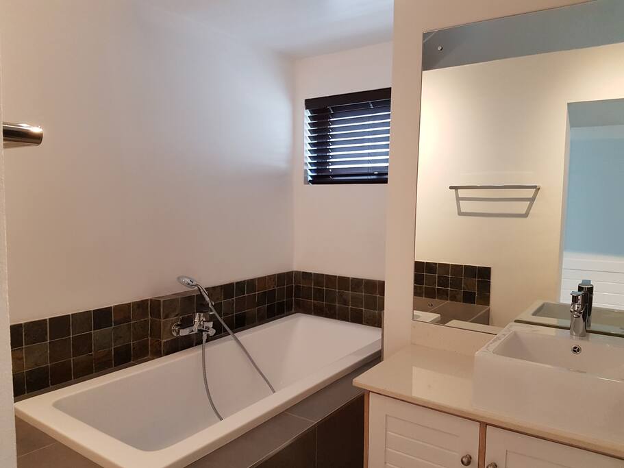 Bath tub attached to the Basement bedroom