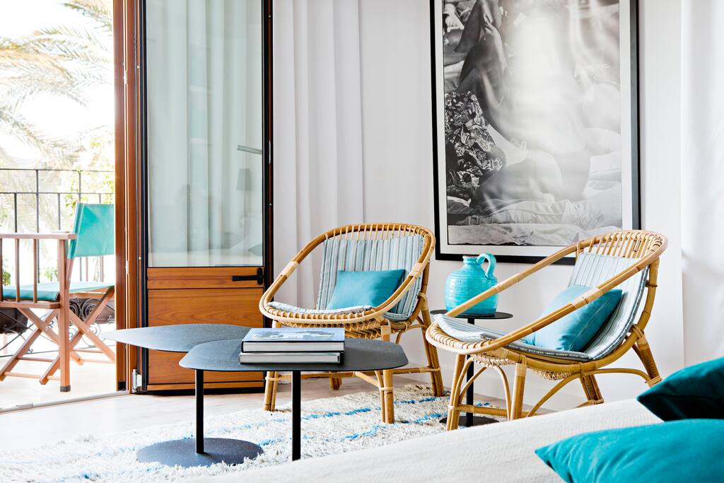 Cane seats , small table, marocan whool rug will make you feel so relax