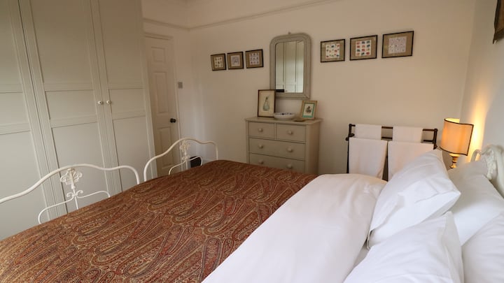 The bedroom. The room can be prepared as two single beds or one super king size bed.