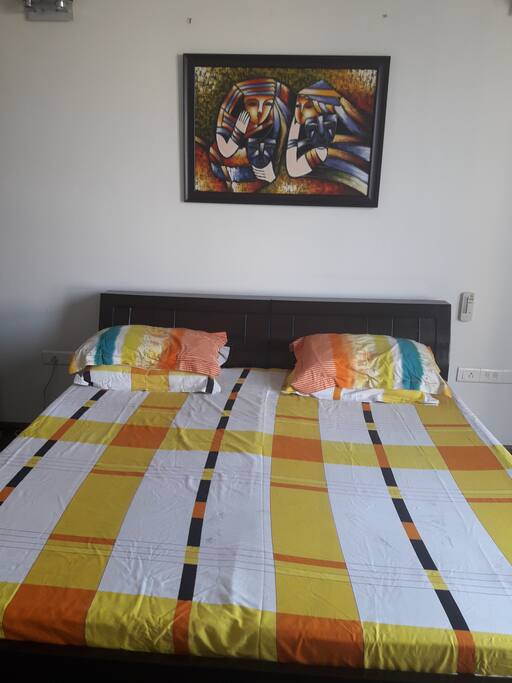 Comfortable double bed with 4 pillows