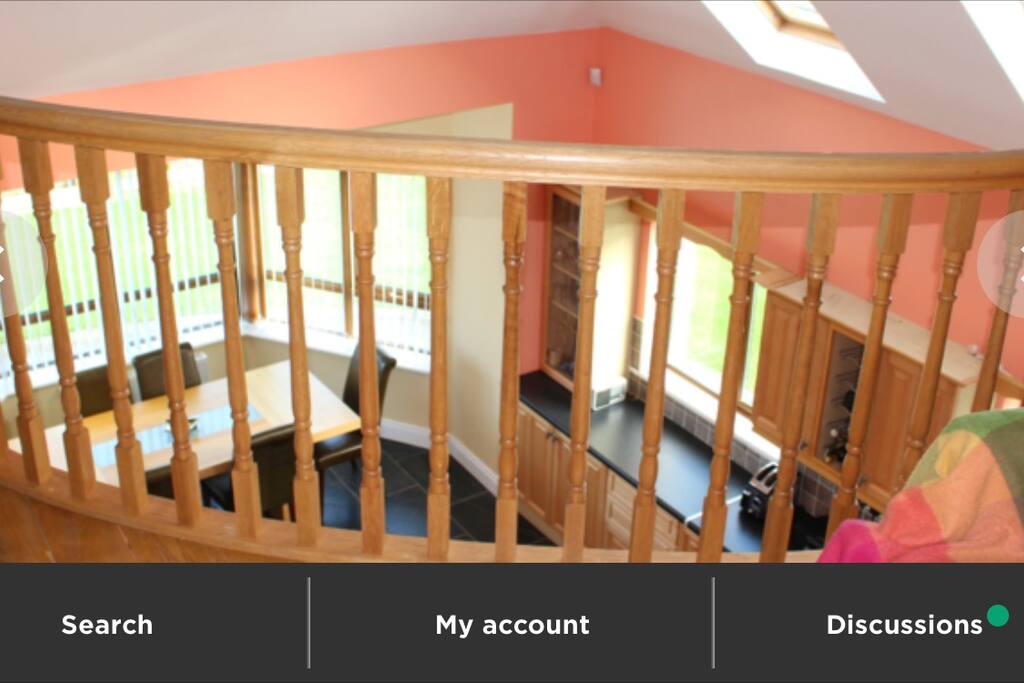 Tv room balcony over kitchen