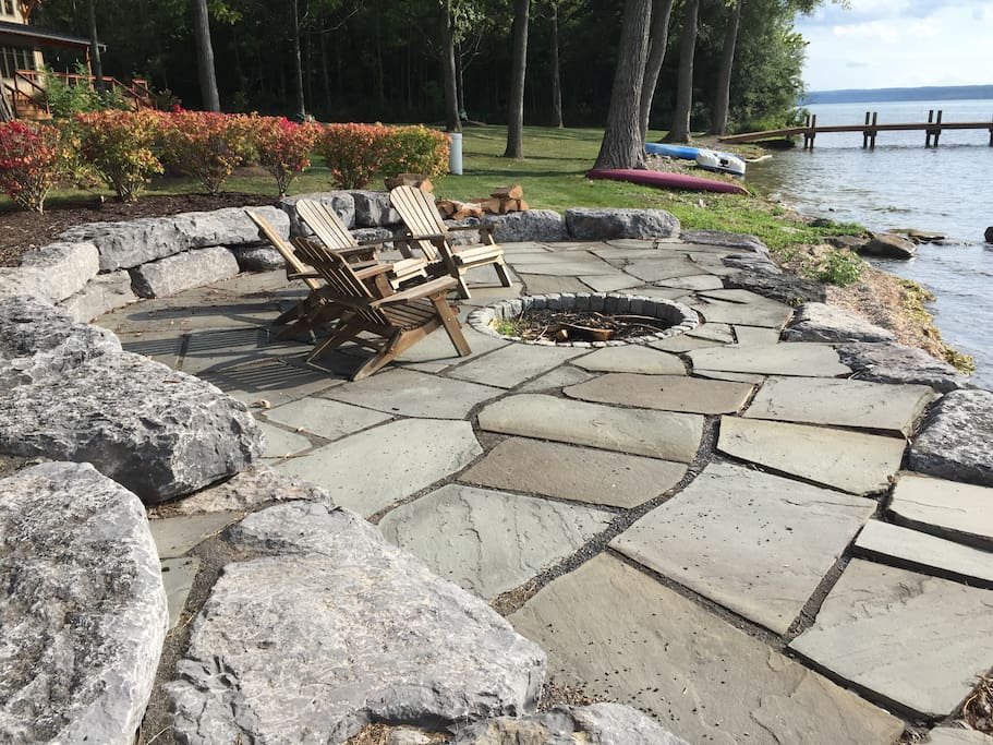 Lakeside fire pit with Adirondack seating