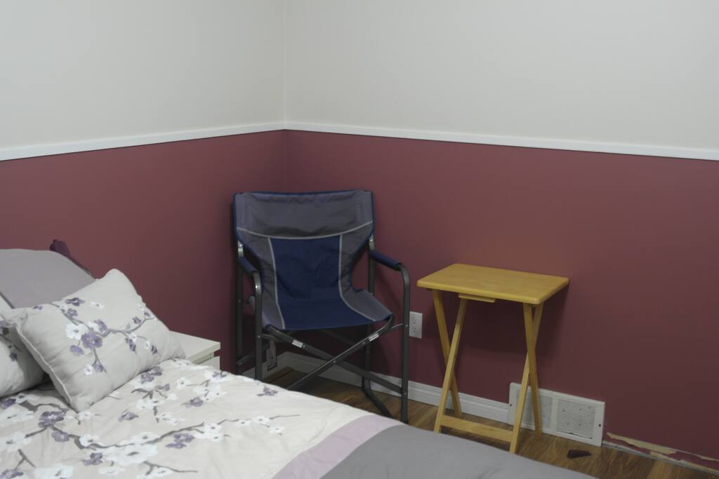 Extra chair and TV table to sit and watch TV or Read