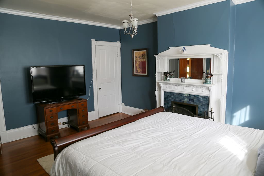 King bed, fireplace and 55" TV.