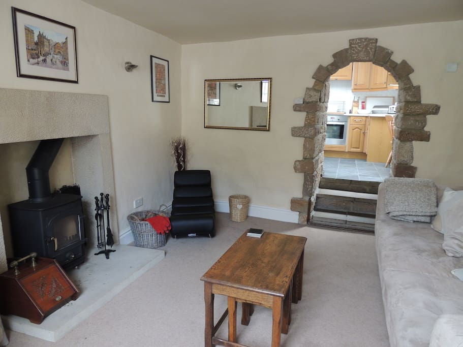 Living room with wood burning fireplace