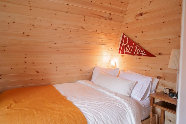 Main floor bedroom with queen bed