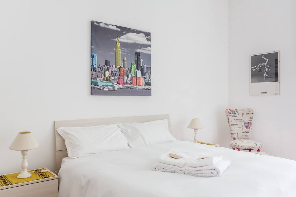 The Bedroom - The comfortable double bed with soft bed-linen and towels