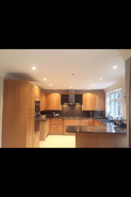 Spacious kitchen with breakfast Bar