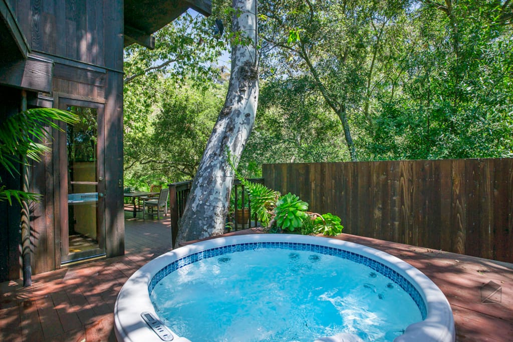 Commune with nature in the private outdoor hot tub.