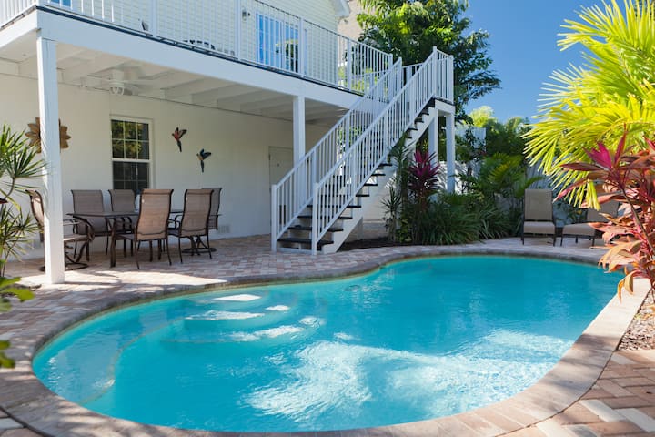 Private pool and sun deck behind Happy Island Cottage