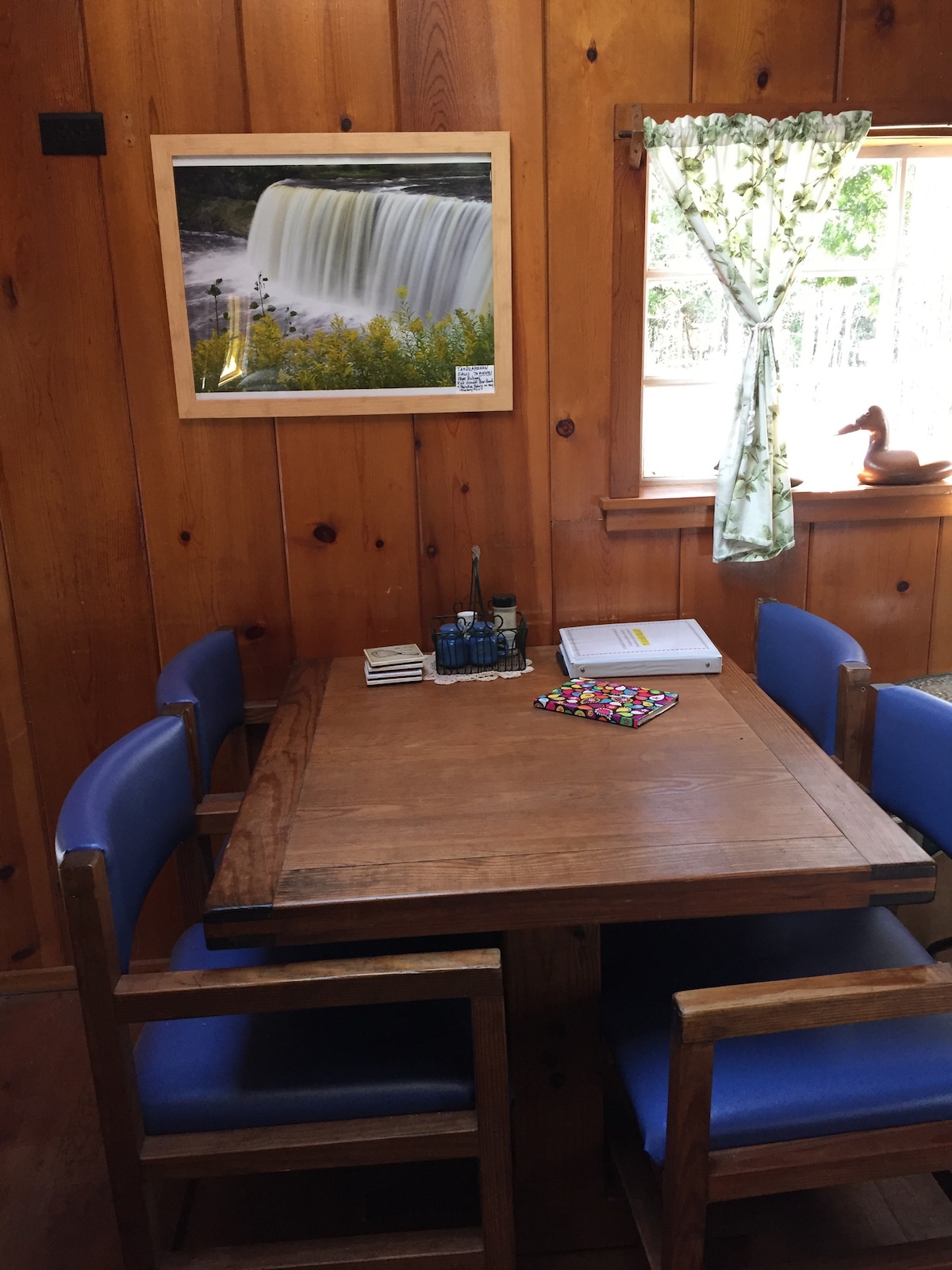 The eating area features lovely This End Up table and chairs.