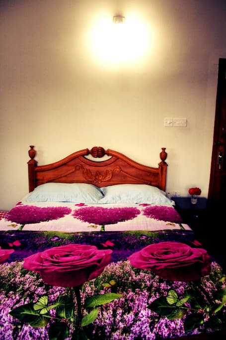 Bed space with floral bedsheet