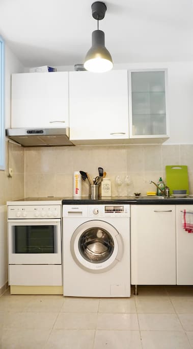 The kitchen is fully equipped and provides a washing machine.