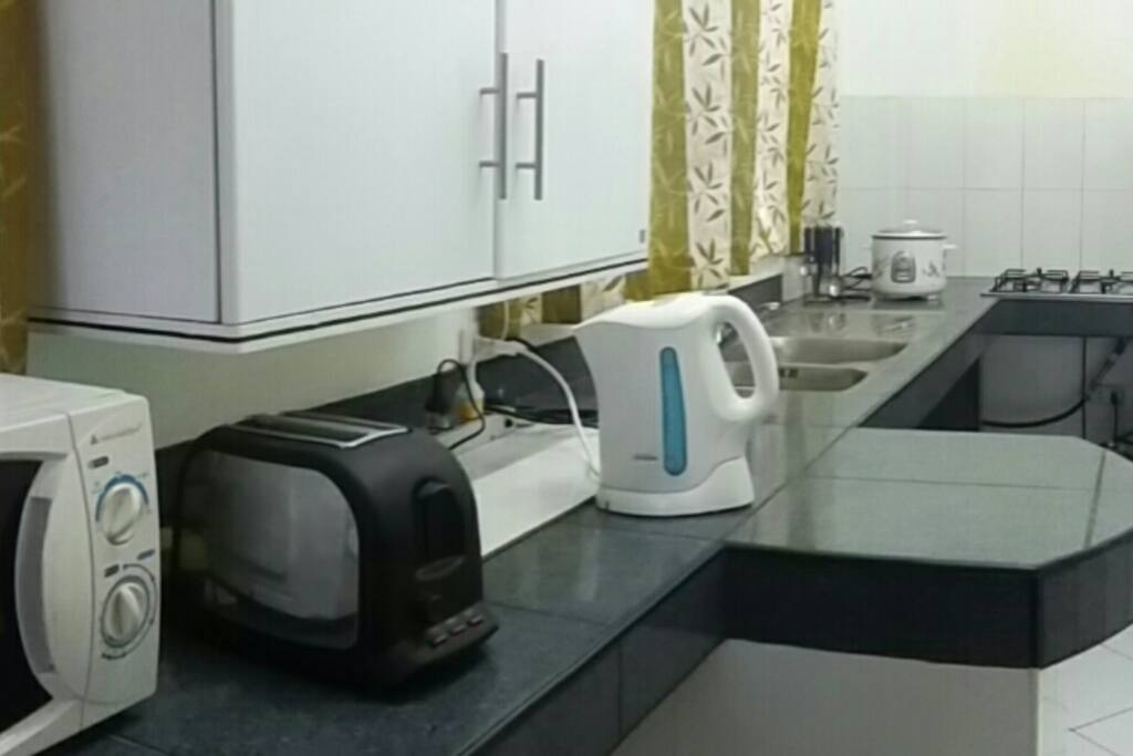 Full kitchen with all modern appliances and gas stove