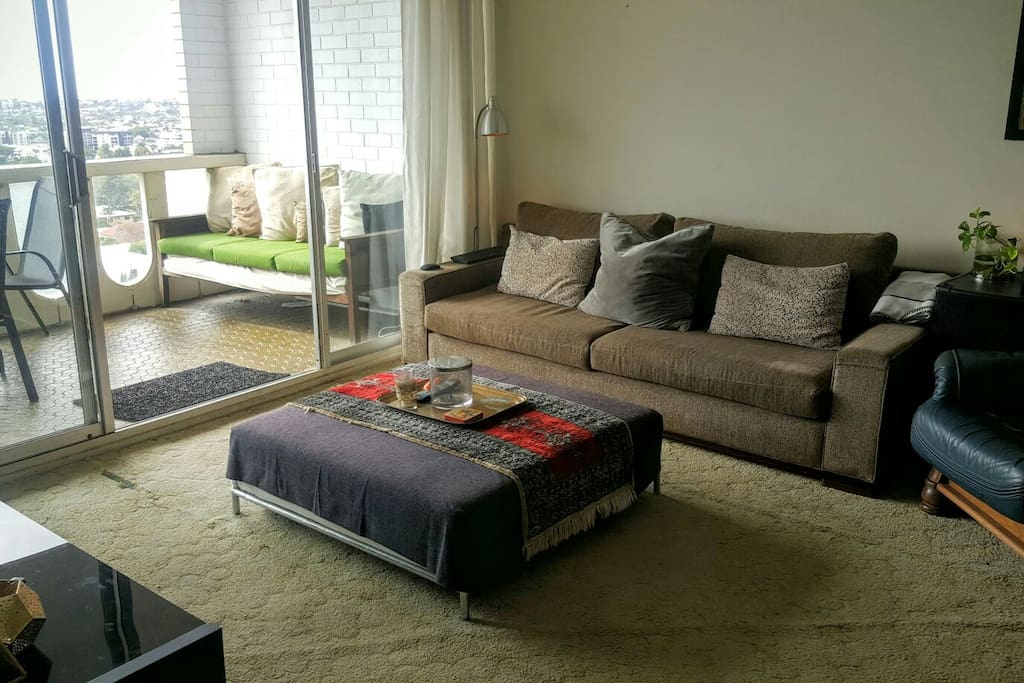 Lounge room features flat screen TV. Excellent sound system views over Brisbane's iconic New Farm & out to the bay.