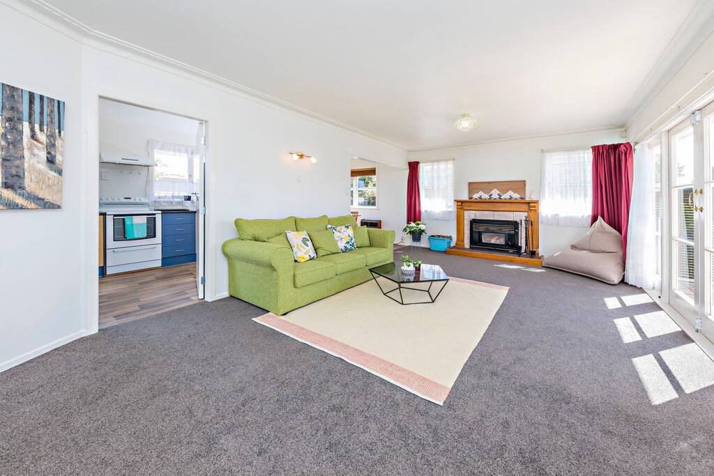 Living room with a indoor fireplace, warm in winter