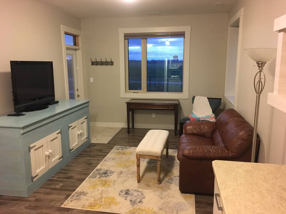 Large flat screen TV, and desk area with a view. Private entrance.