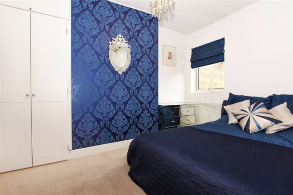 Double bed and wardrobe and drawer space.
