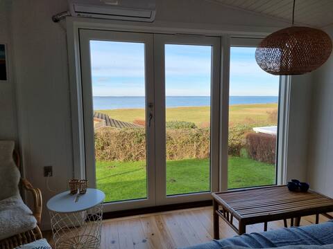 Popular Airbnb listing: Panoramic sea view cottage in an idyllic landscape in Langeland