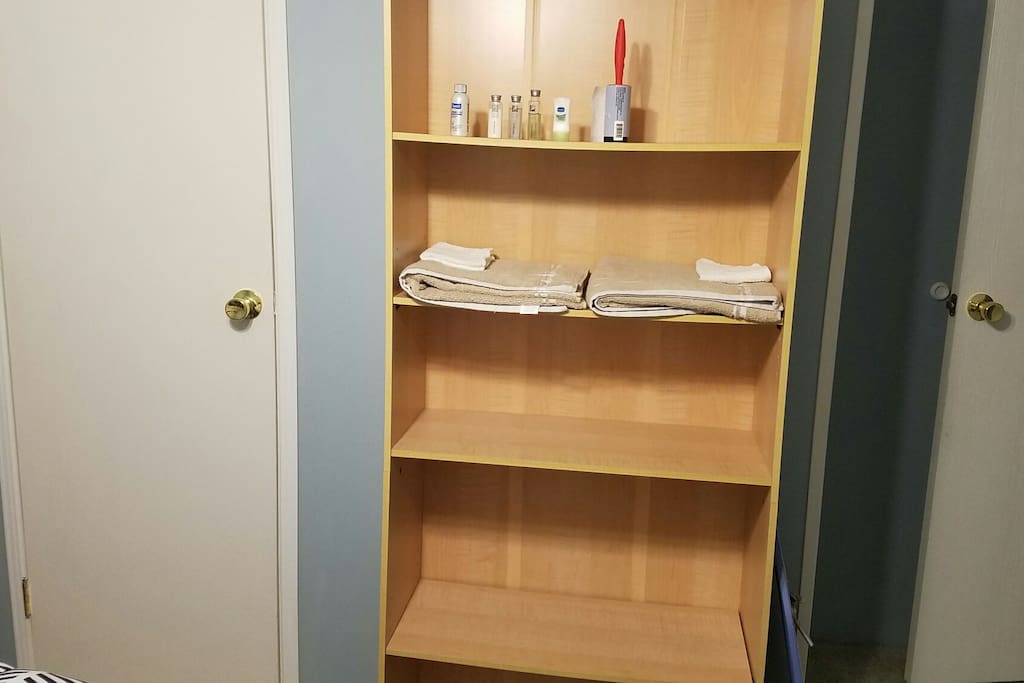 Shelf for towels Keys personal items and closet for hanging clothes