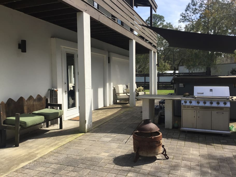 Courtyard: seating for six, fire pit with starter stock of wood & propane grill