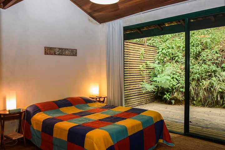 Bedroom 5 (en-suite), also with a double bed and private deck