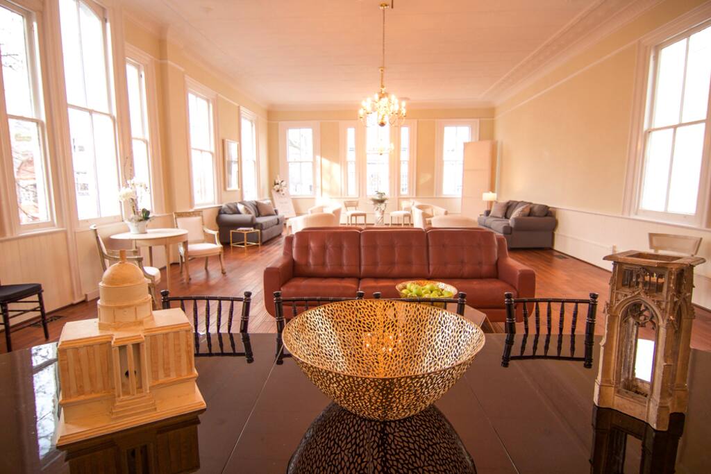 The Concordia ballroom features multiple seating areas as well as a dining area that can easily accommodate 12-14. The space can easily be converted for entertaining larger groups.