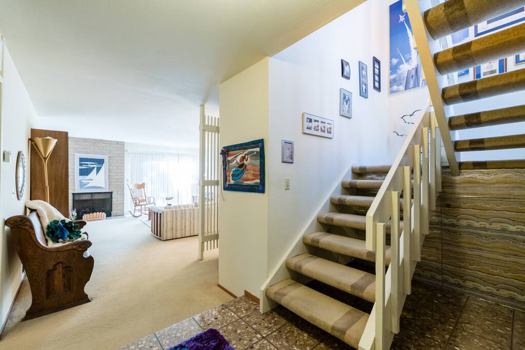 Welcome! Turn right at the top of the stairs and your room will be just a few steps where you will be "Cruising or Snoozing in the Sailboat Room!"