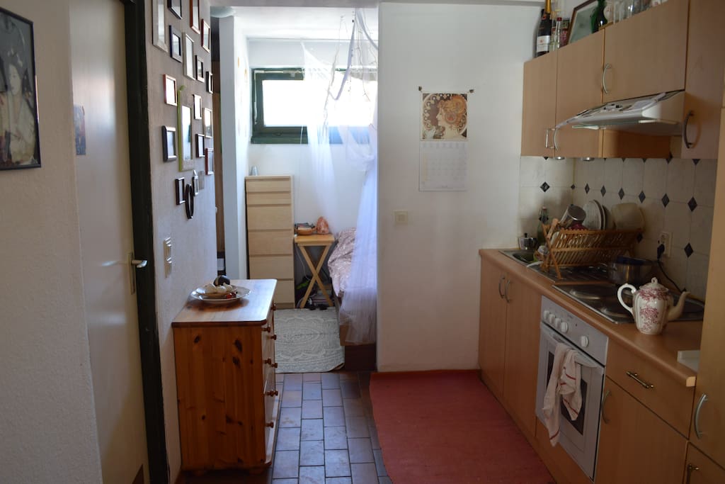 Kitchen with bathroom to the left