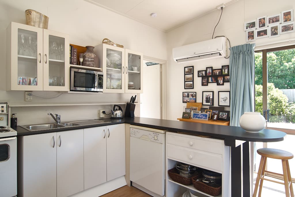 Kitchen, dishwasher and large heat pump to ensure you're comfortable!