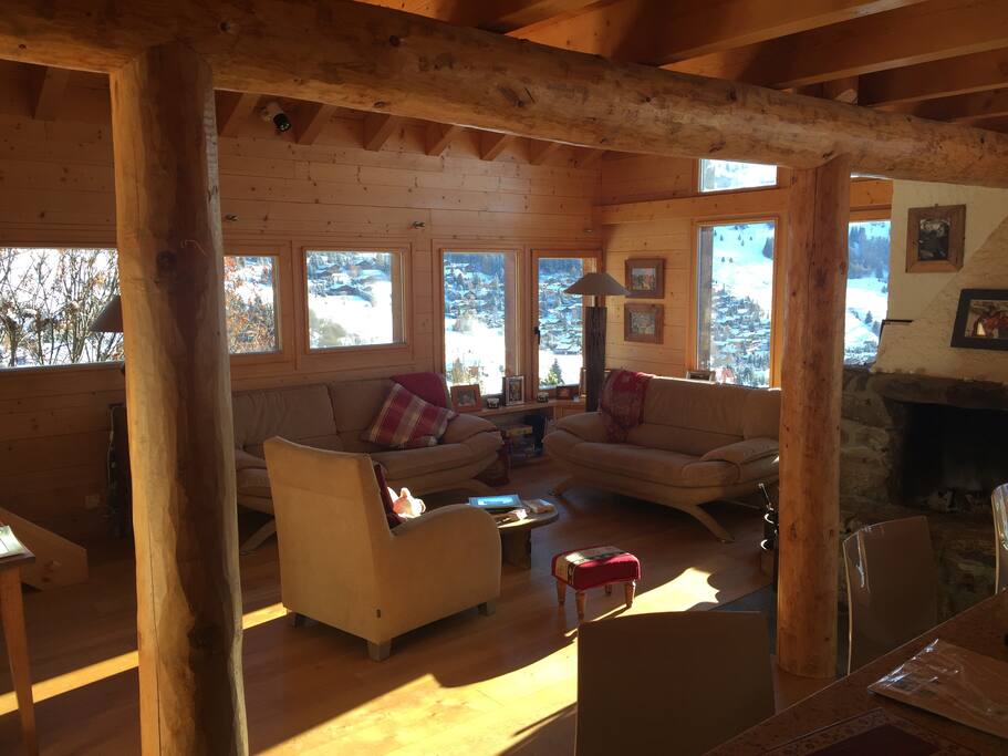 Large & cozy living room with open fireplace