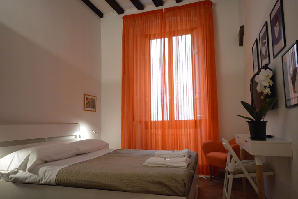 Bedroom with 1 double bed, TV, A/C, armchairs, wardrobe, window
