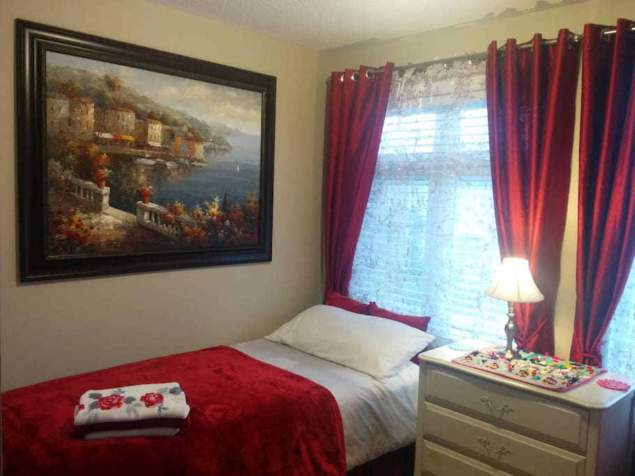 Same bedroom, different layout, with 2 beds in the room
