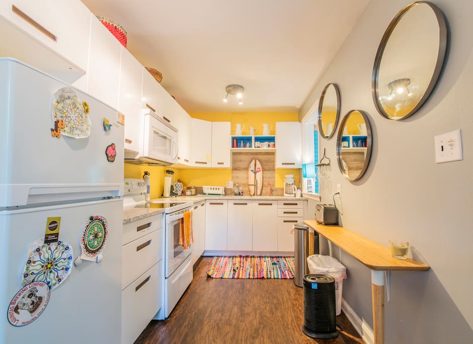 I adore this kitchen. You will love how easy it is to prepare your meals in here. You have a fully equipped kitchen. Every tool, dish, condiment, and many extras for you. The only thing I do not have is a dishwasher. sorry...just not enough room.