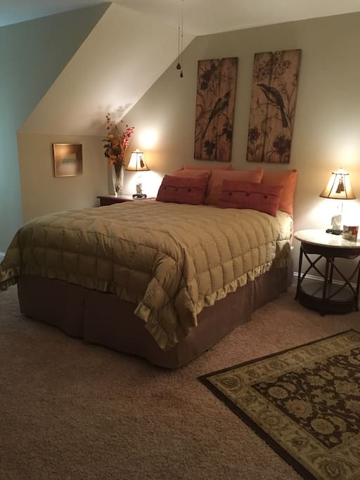 Queen bed with feather topper
