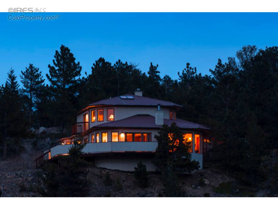 A look at the house from the outside in the evening.